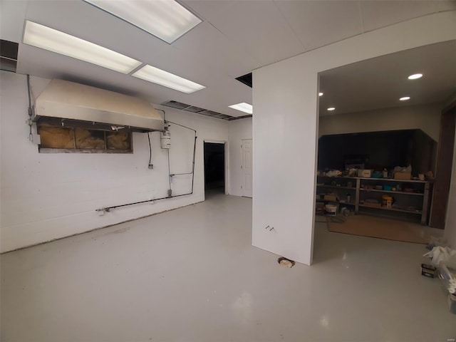 basement featuring recessed lighting
