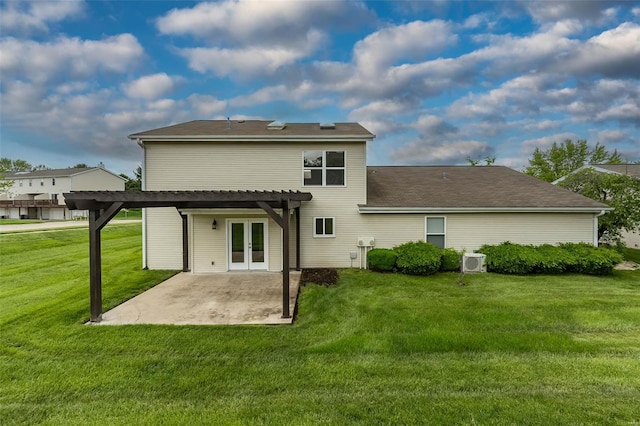 back of property with a pergola, ac unit, a patio area, french doors, and a yard