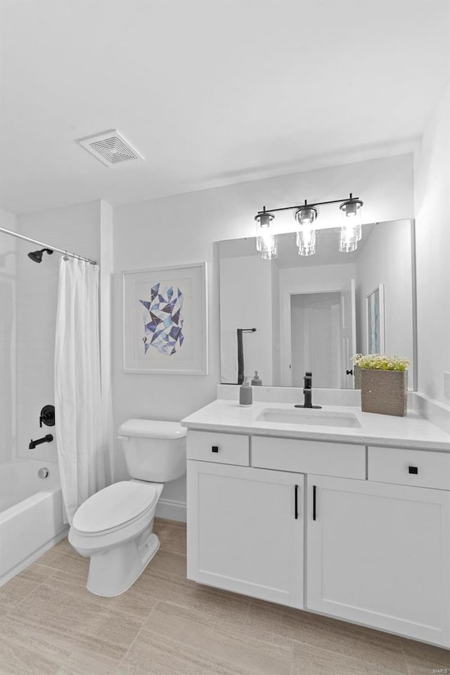 full bath featuring visible vents, shower / bath combo with shower curtain, toilet, and vanity