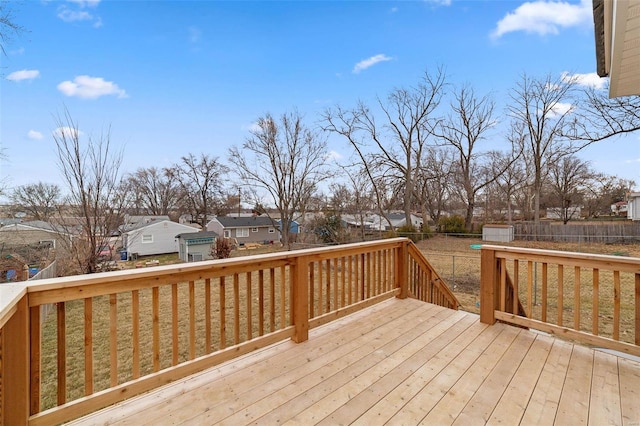 deck featuring a residential view and fence private yard