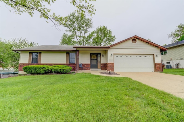 single story home with concrete driveway, a garage, brick siding, and a front yard