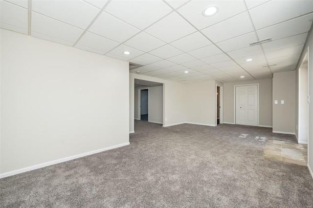 carpeted spare room with recessed lighting, baseboards, visible vents, and a paneled ceiling
