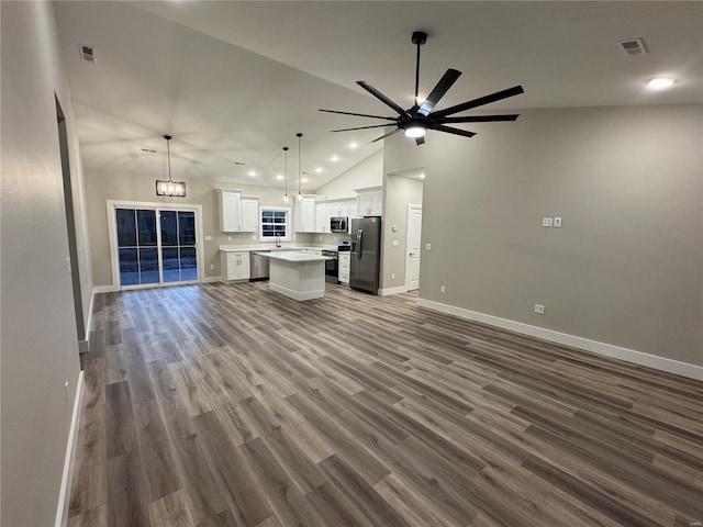unfurnished living room featuring visible vents, baseboards, a ceiling fan, and recessed lighting