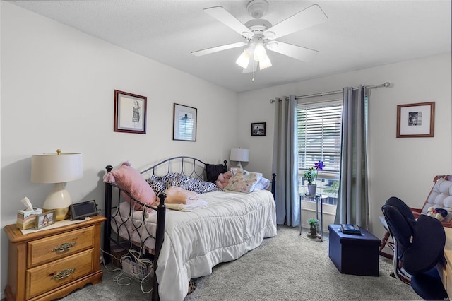 bedroom featuring carpet floors and ceiling fan