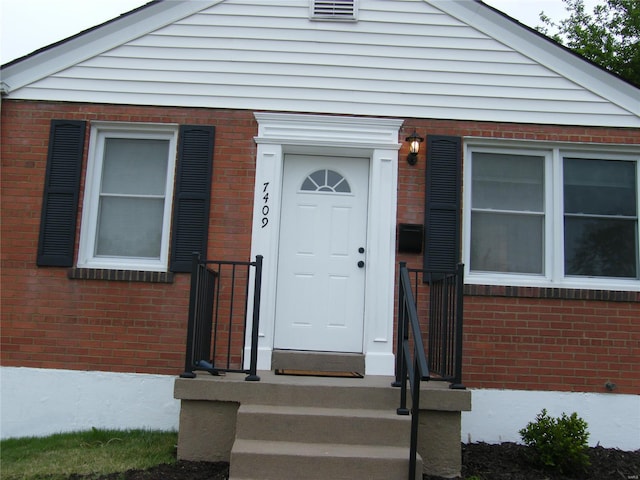 view of front facade with brick siding