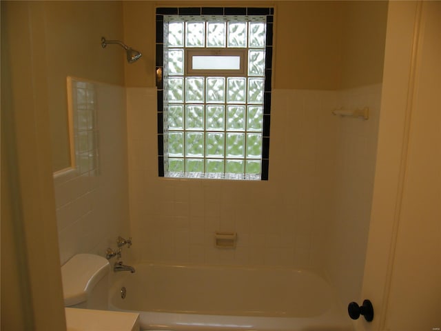 full bathroom featuring shower / bathtub combination and toilet