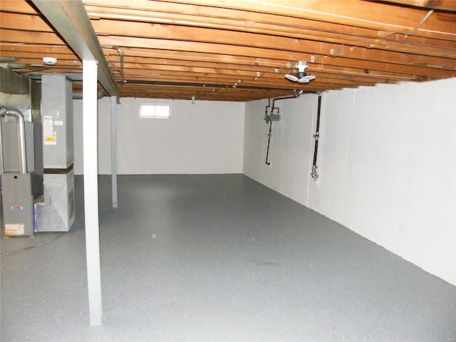 basement featuring heating unit