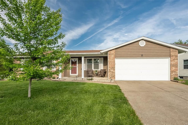 ranch-style home featuring a garage, concrete driveway, a front lawn, and brick siding