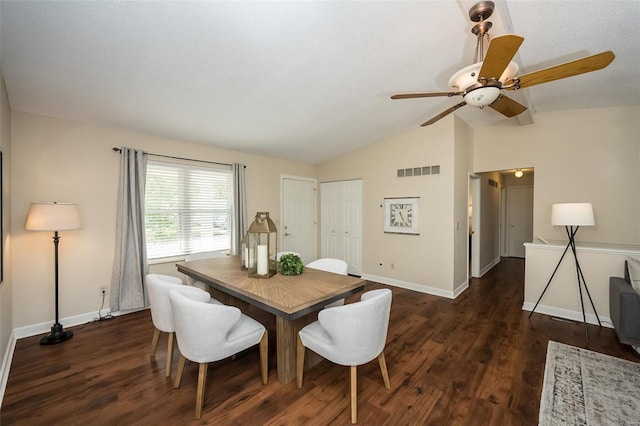 dining area featuring visible vents, a ceiling fan, dark wood finished floors, and lofted ceiling