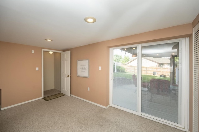 unfurnished room featuring baseboards, recessed lighting, and light colored carpet