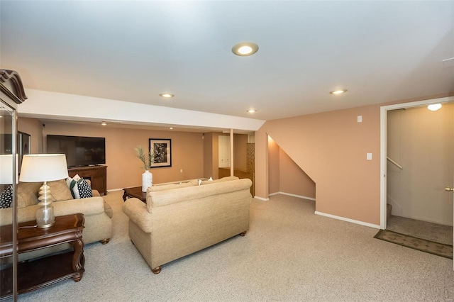 living area with recessed lighting, baseboards, carpet flooring, and stairs