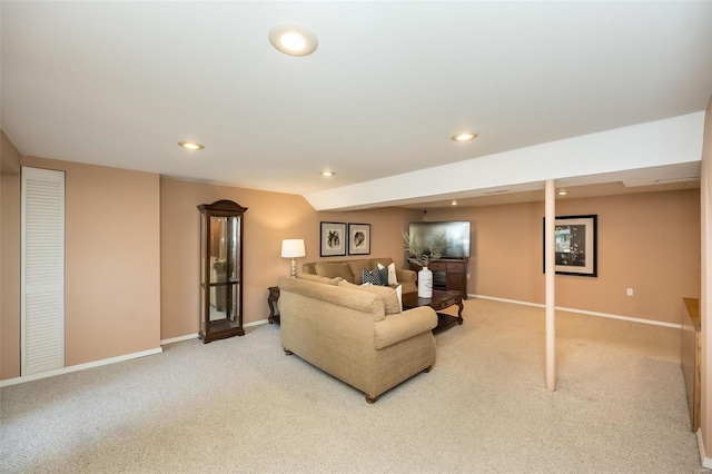 living area with baseboards, recessed lighting, and light colored carpet