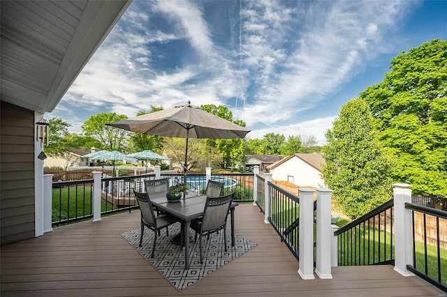 deck featuring outdoor dining area