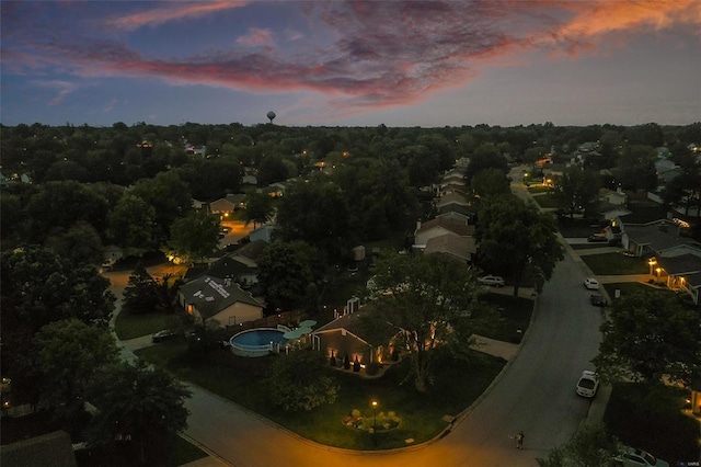 aerial view at dusk with a residential view