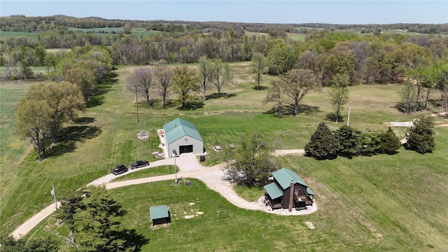 birds eye view of property featuring a rural view