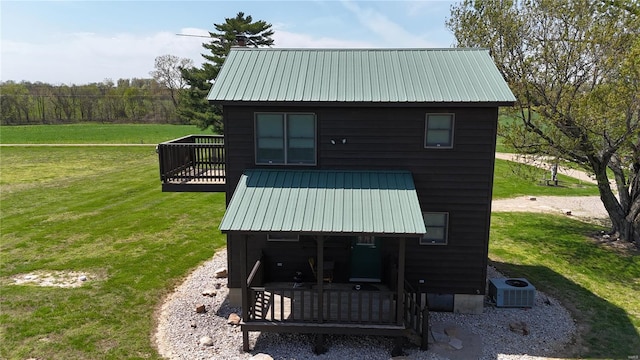 view of outdoor structure featuring central air condition unit