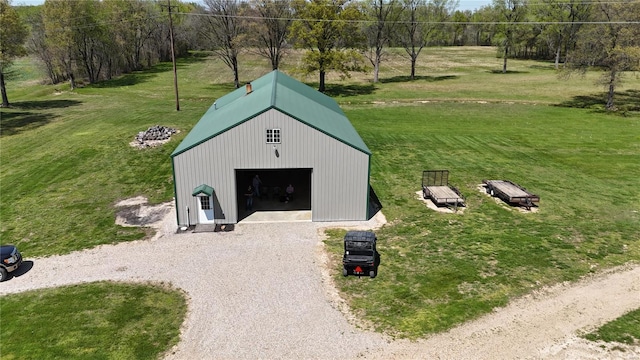 exterior space with gravel driveway