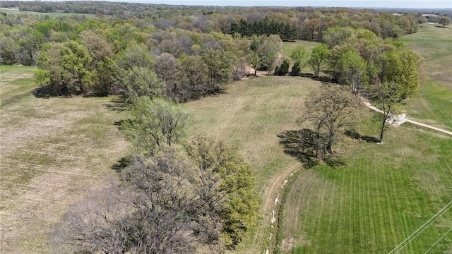 aerial view with a view of trees and a rural view