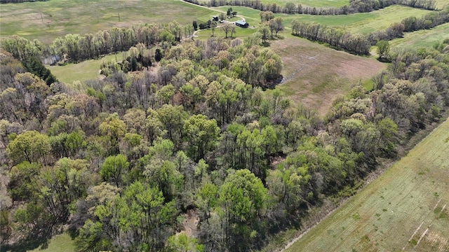 birds eye view of property with a rural view