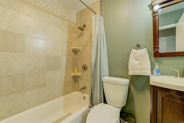 bathroom with toilet, shower / bath combo, and vanity