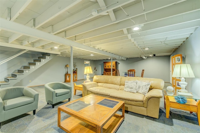 carpeted living area with stairway