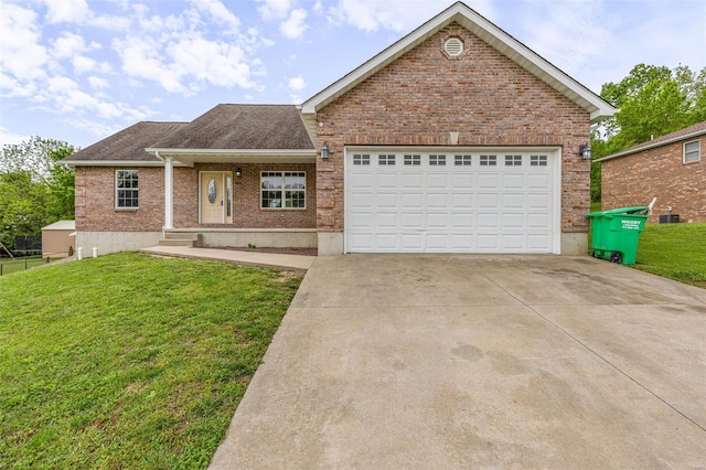 ranch-style home with concrete driveway, an attached garage, a front lawn, and brick siding
