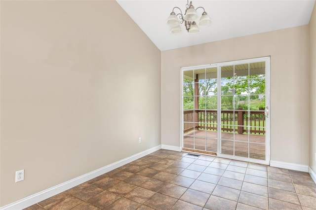 unfurnished room featuring an inviting chandelier, baseboards, and lofted ceiling