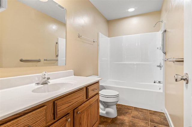 bathroom with toilet, baseboards, vanity, and bathtub / shower combination