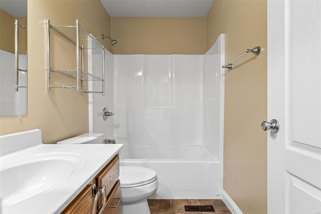full bathroom with toilet, visible vents, vanity, and shower / tub combination