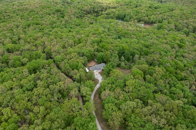 drone / aerial view with a view of trees