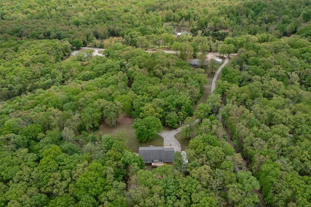bird's eye view featuring a forest view