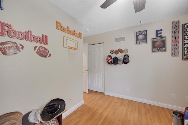 interior space with visible vents, baseboards, and light wood-type flooring