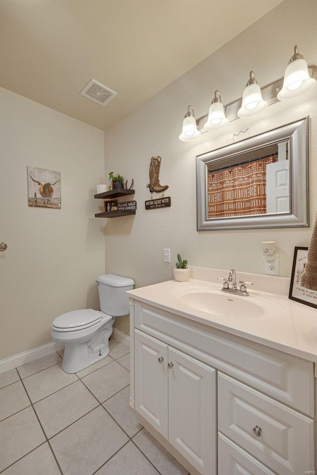 full bathroom featuring vanity, toilet, tile patterned floors, baseboards, and visible vents