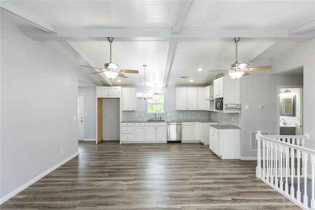 kitchen featuring tasteful backsplash, a sink, white cabinets, ceiling fan with notable chandelier, and stainless steel appliances