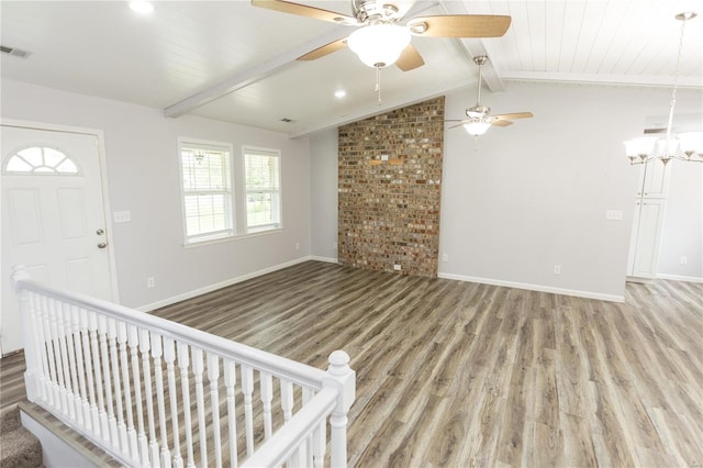unfurnished living room featuring visible vents, baseboards, ceiling fan, light wood-type flooring, and vaulted ceiling with beams