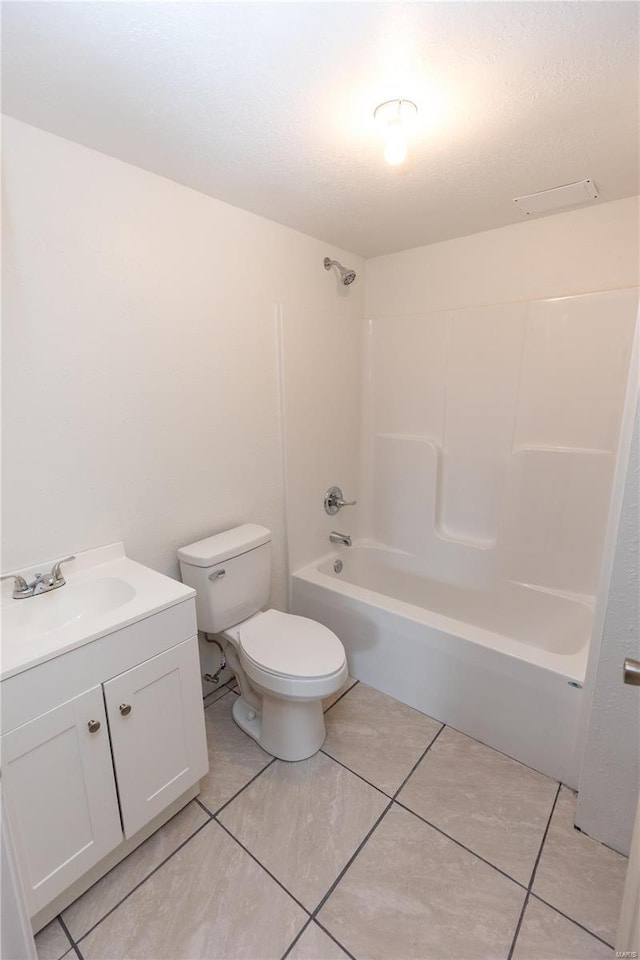 full bathroom featuring vanity, toilet, shower / tub combination, a textured ceiling, and tile patterned floors