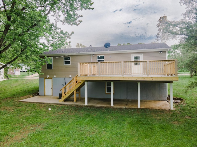 back of house with a patio, a lawn, stairs, and a deck