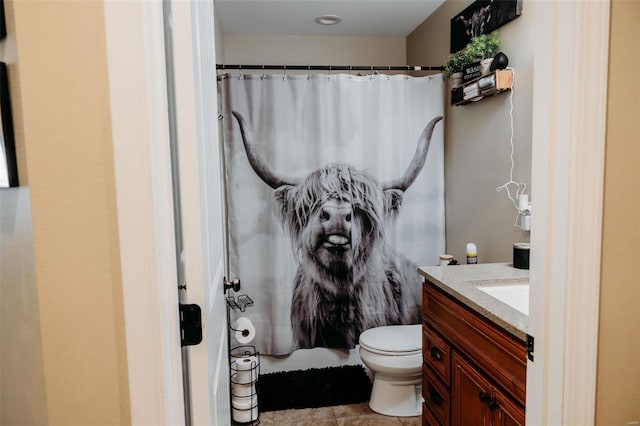 full bath with vanity, tile patterned flooring, toilet, and curtained shower