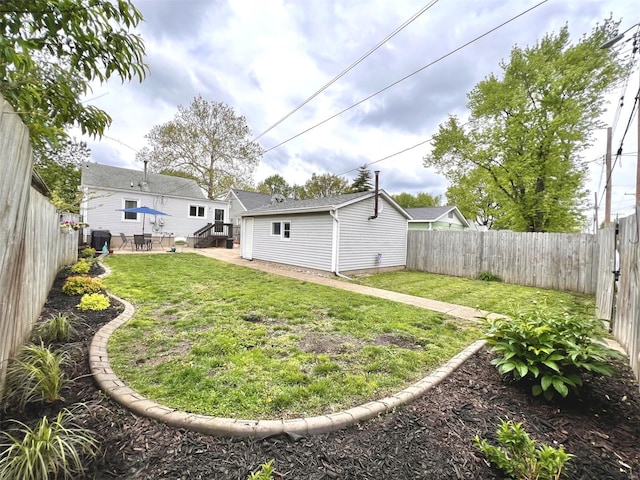view of yard featuring a fenced backyard and a patio