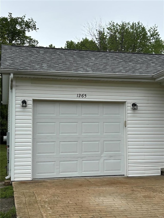 garage featuring driveway