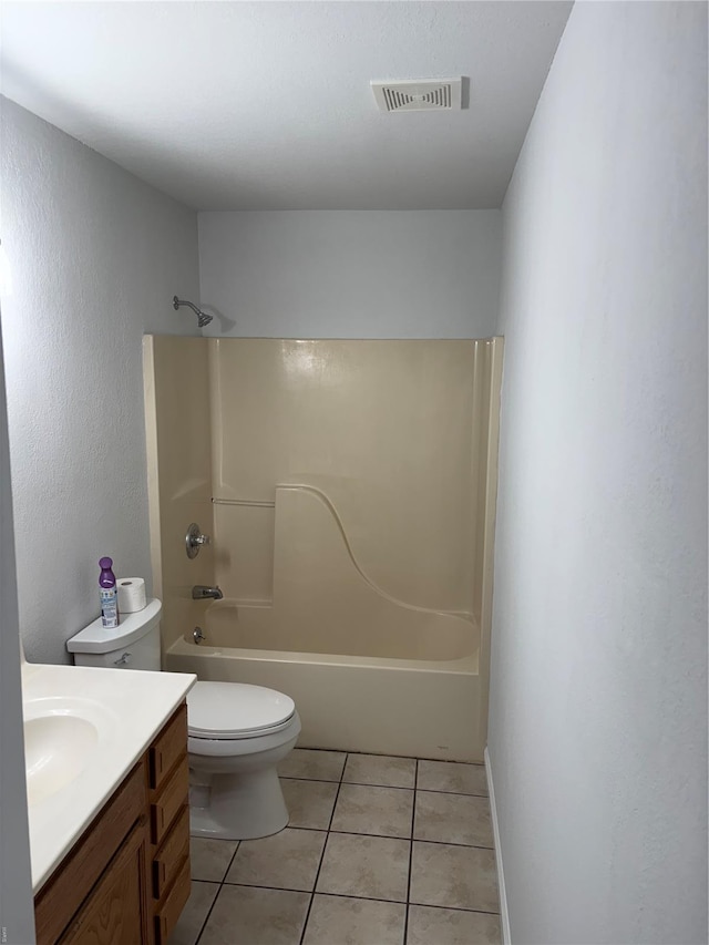 full bathroom featuring visible vents, tile patterned flooring, vanity, tub / shower combination, and toilet