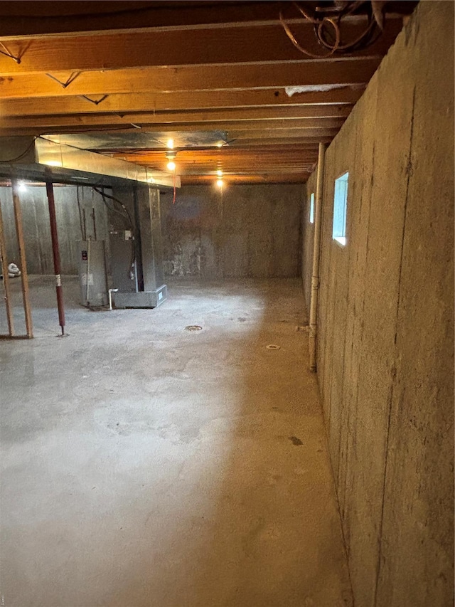 basement featuring water heater