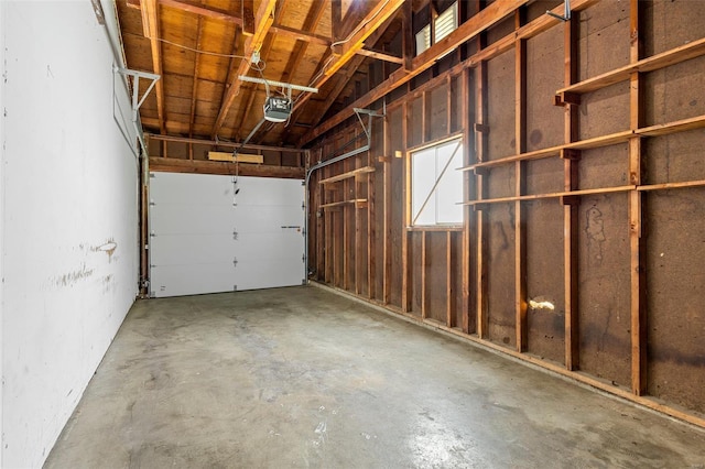 garage featuring a garage door opener