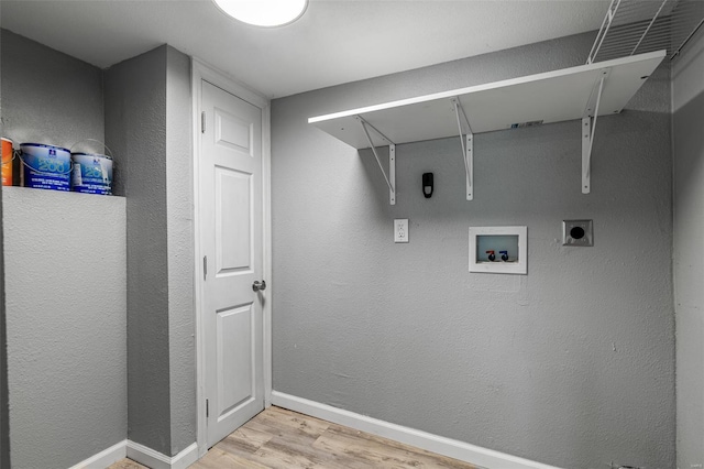 laundry room with laundry area, washer hookup, light wood-style floors, baseboards, and electric dryer hookup
