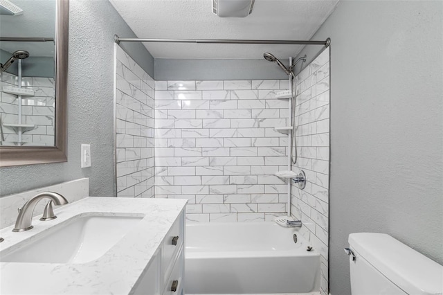 bathroom featuring vanity, a textured wall, toilet, a textured ceiling, and shower / bathing tub combination