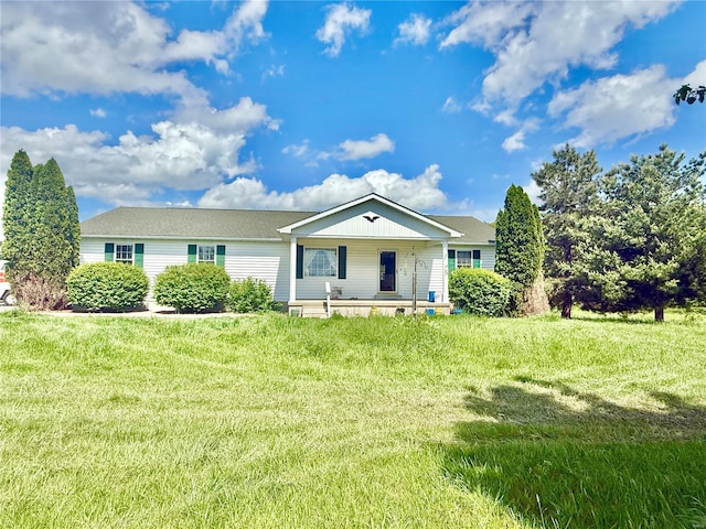 ranch-style house with covered porch and a front yard