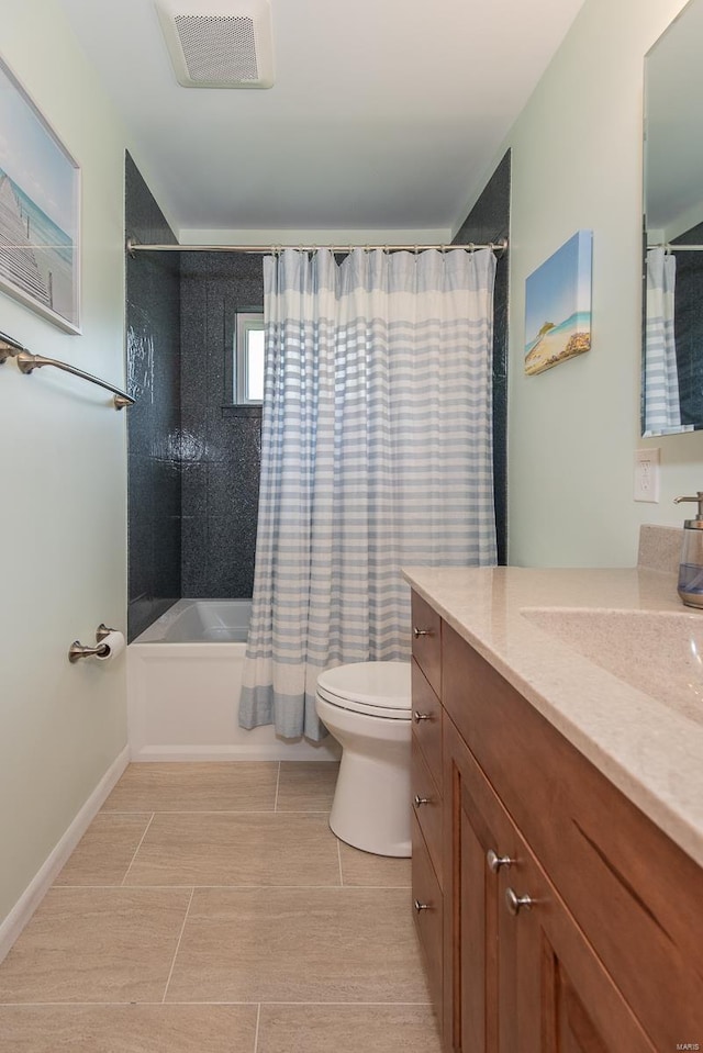 bathroom featuring shower / bath combo with shower curtain, toilet, visible vents, tile patterned floors, and vanity