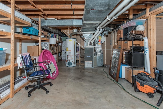 unfinished below grade area with heating unit and gas water heater