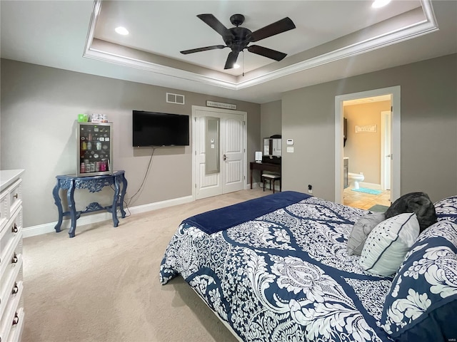 bedroom with visible vents, light carpet, baseboards, recessed lighting, and a raised ceiling