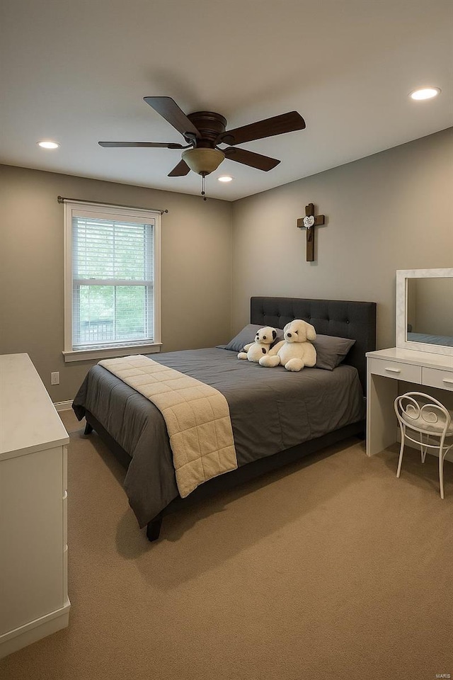 carpeted bedroom featuring recessed lighting and a ceiling fan